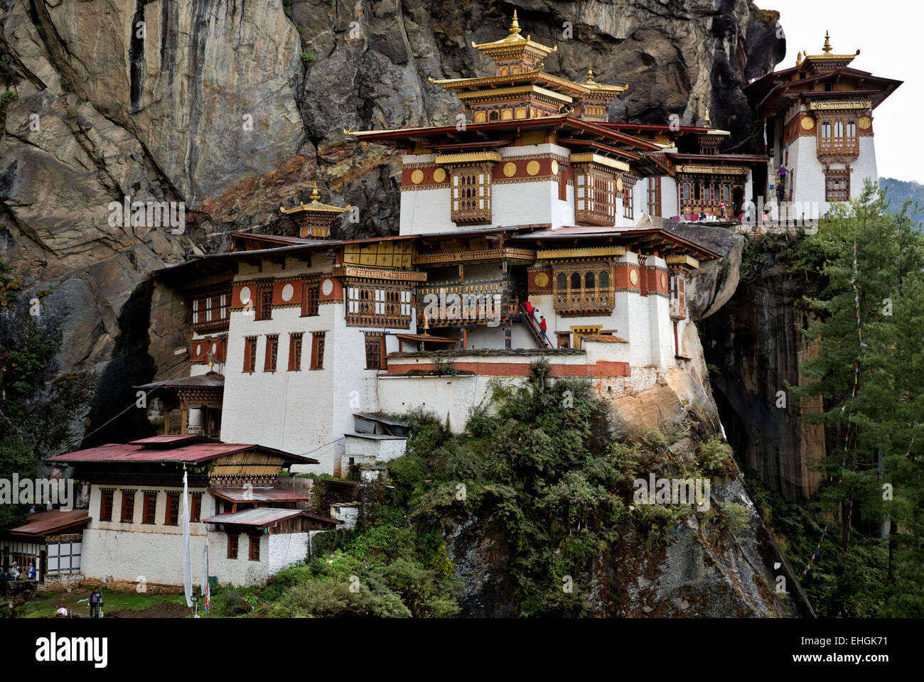 BHUTAN - Taktshang Goemba, (the Tiger's Nest Monastery), perched on the side of a cliff high above the Paro River Valley. Stock Photo