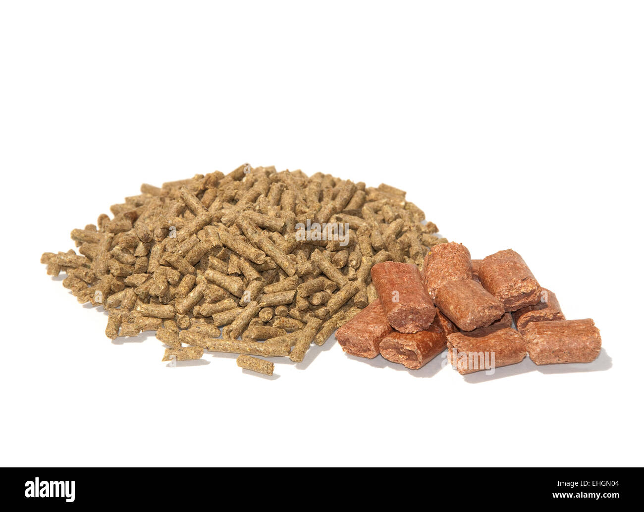 Pelleted horse feed and treats on white Stock Photo