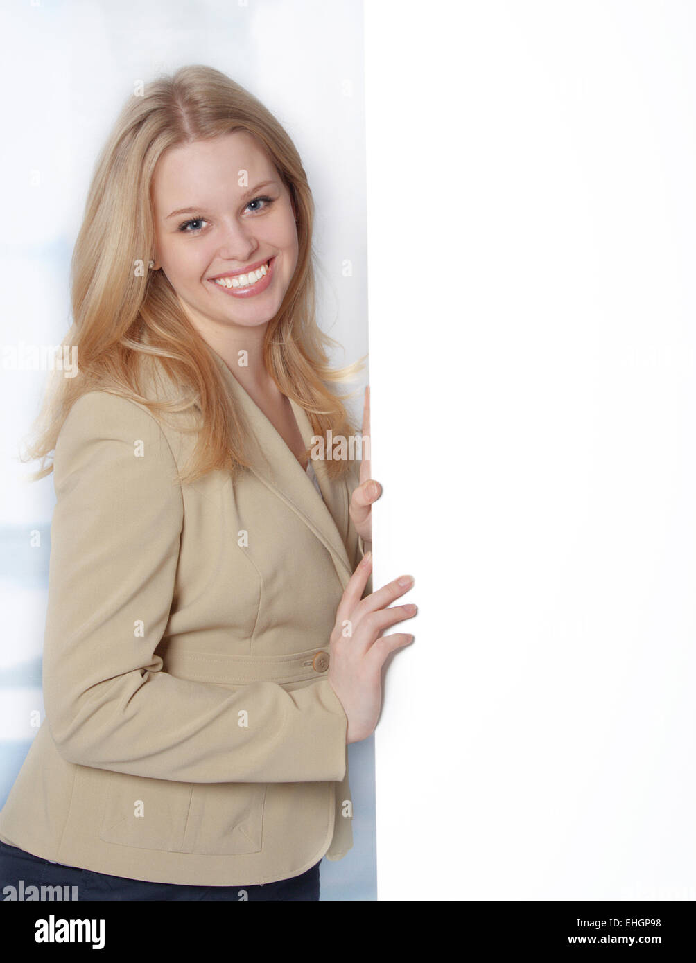 Young business woman with a white banner Stock Photo
