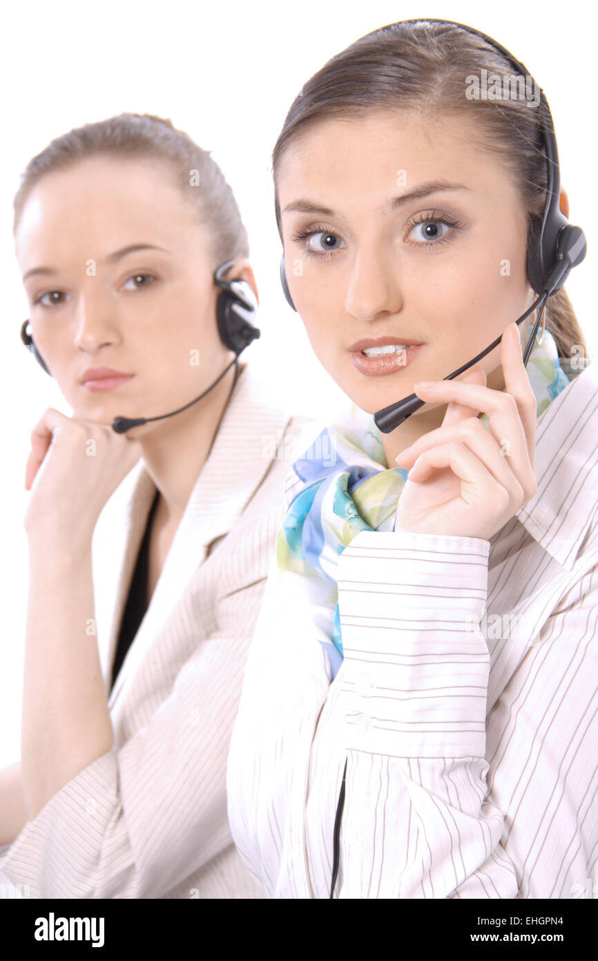 Two female customer service representatives Stock Photo - Alamy