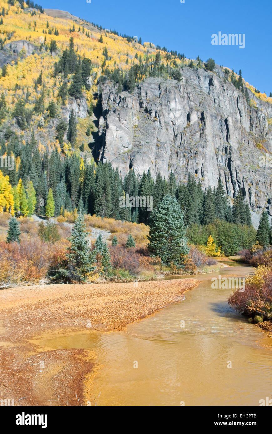 River runs yellow in the high country Colorado Stock Photo Alamy