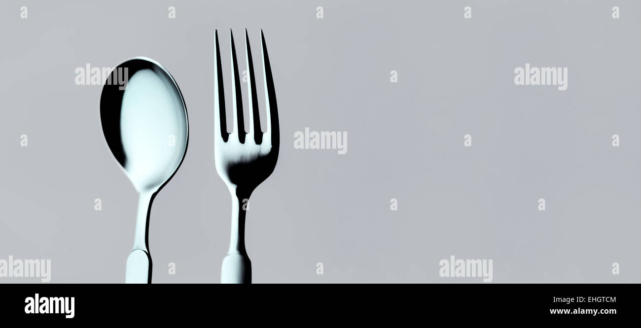 Spoon and Fork, scanned from a 10x8 transparency. Colour/color graded. Stock Photo