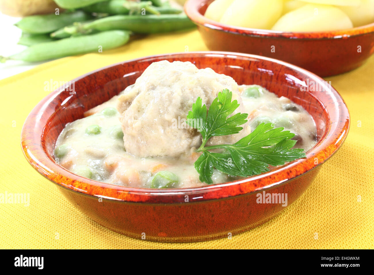 cooked meatballs in a white sauce Stock Photo