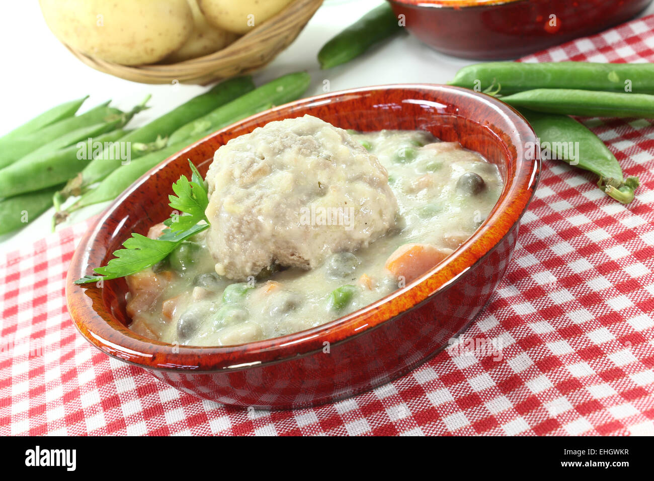 fresh cooked meatballs in a white sauce Stock Photo