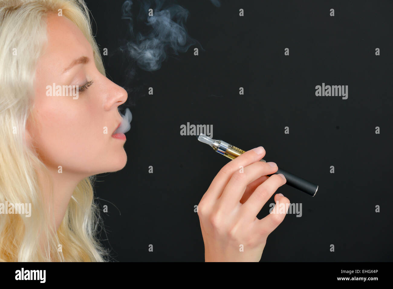 take a drag of cigarette Taking a drag on cigarette hi-res stock photography and images