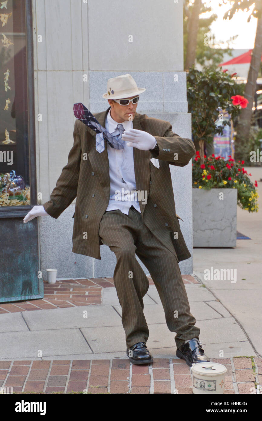 Asheville, North Carolina, USA - September 26, 2014:  A man makes tips as a living statue in Asheville, NC Stock Photo