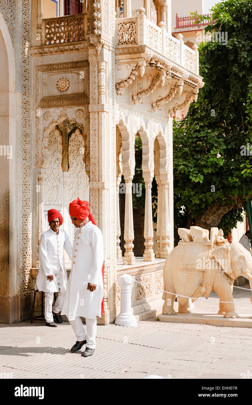 Guards dressed in white uniforms at the Jaipur City Palace and Museum. Stock Photo