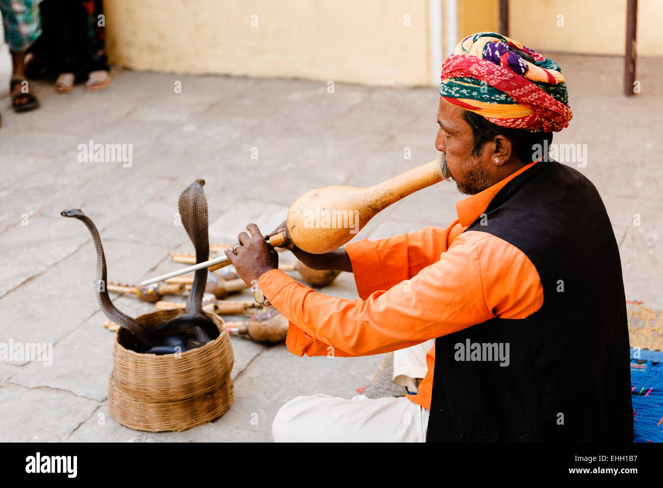 Snake charmer outside the Jaipur City Palace and Museum. Stock Photo