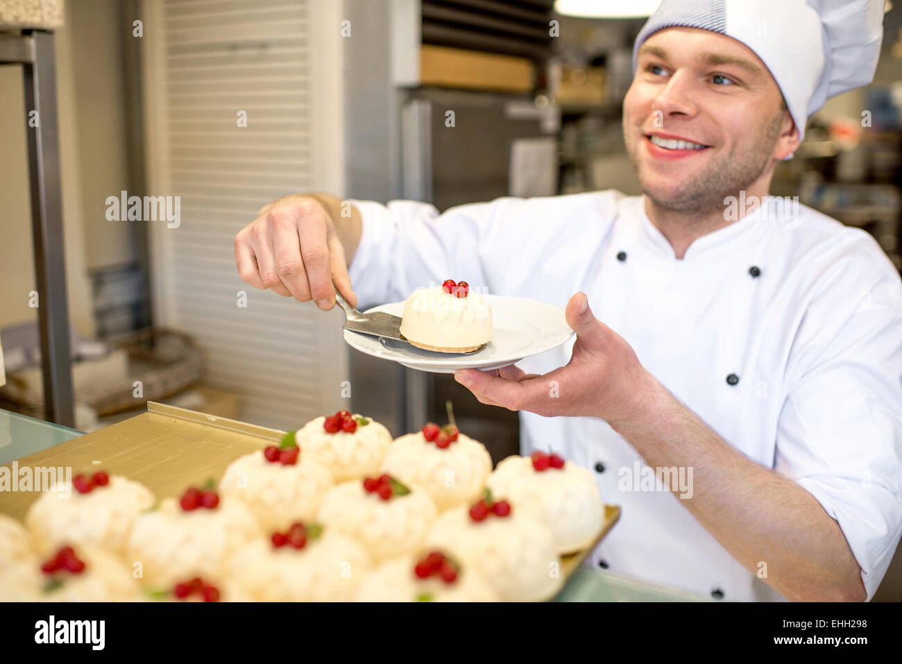 Confectioner with cakes Stock Photo