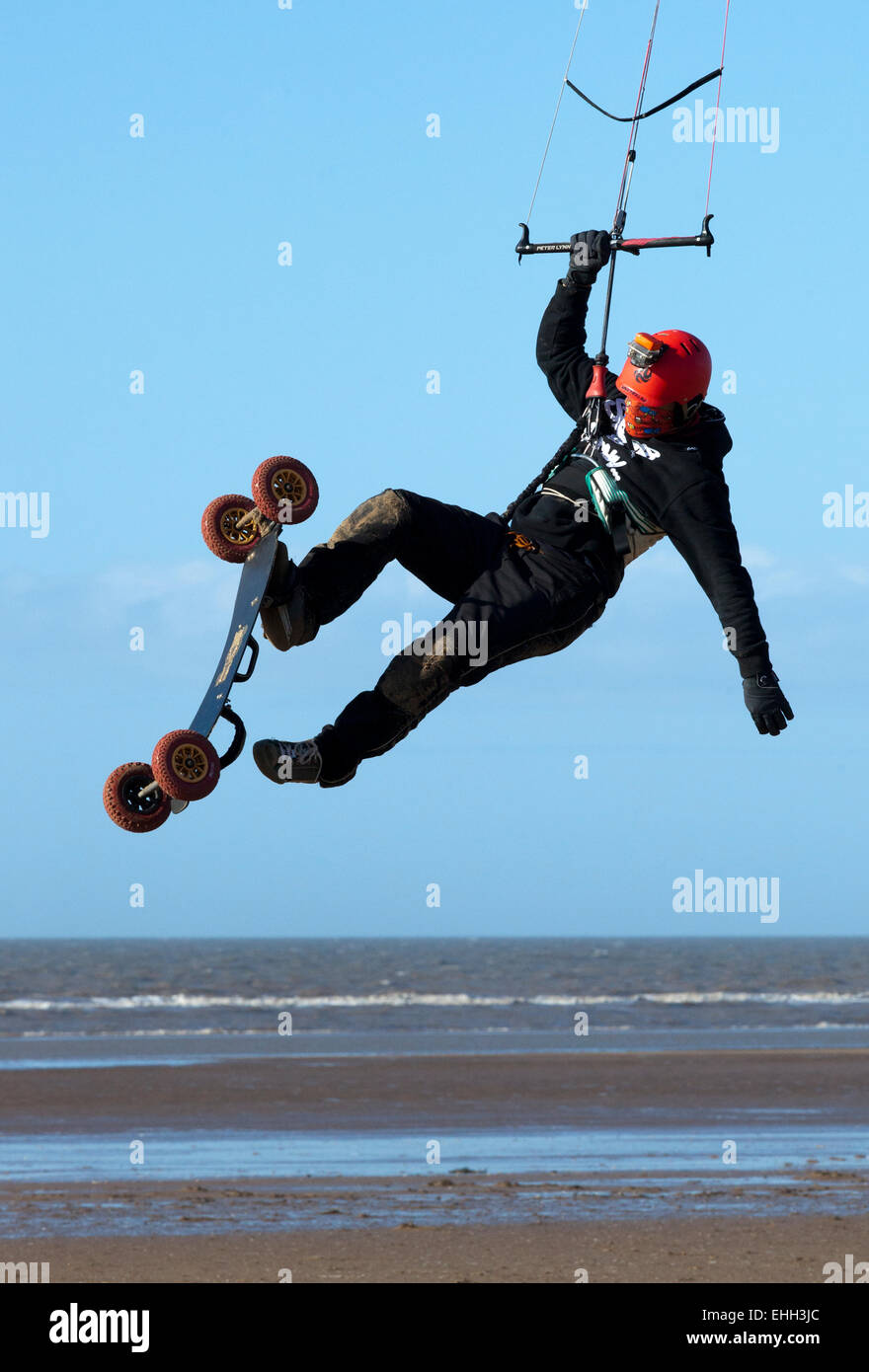 Carl Kirton practicing his kite surfing techniques on Southport beach