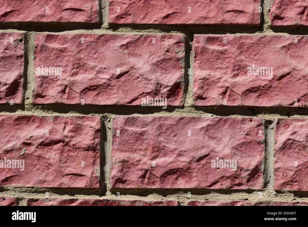 Wall made of roughly processed bricks to be used as background Stock Photo Alamy