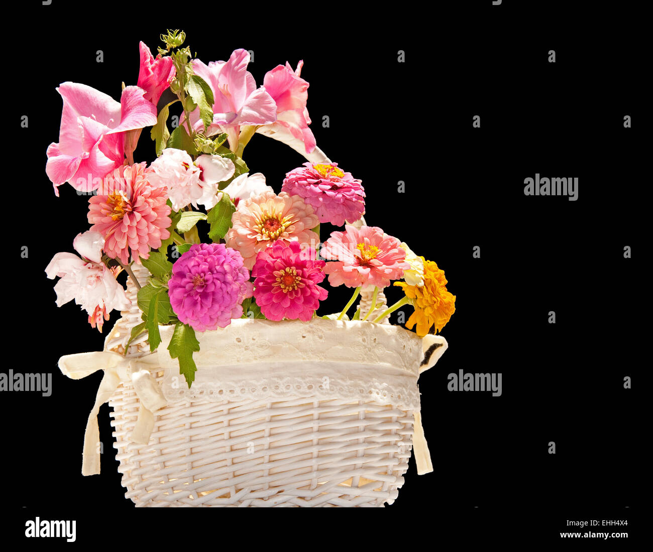Flower basket against dark background Stock Photo