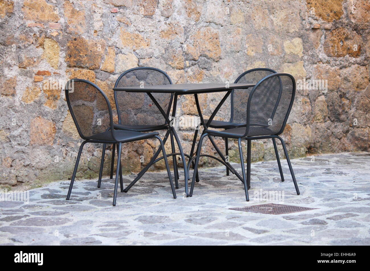 Iron table and chairs Stock Photo