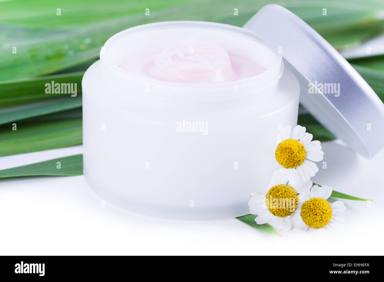 Skincare creams with camomile extract, natural organic cosmetics Stock Photo