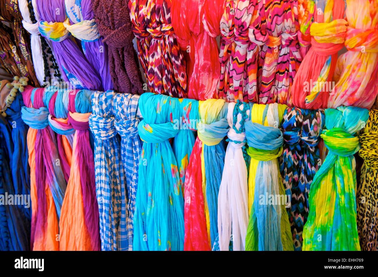 Brightly Colored Scarves on Rack Stock Photo Alamy