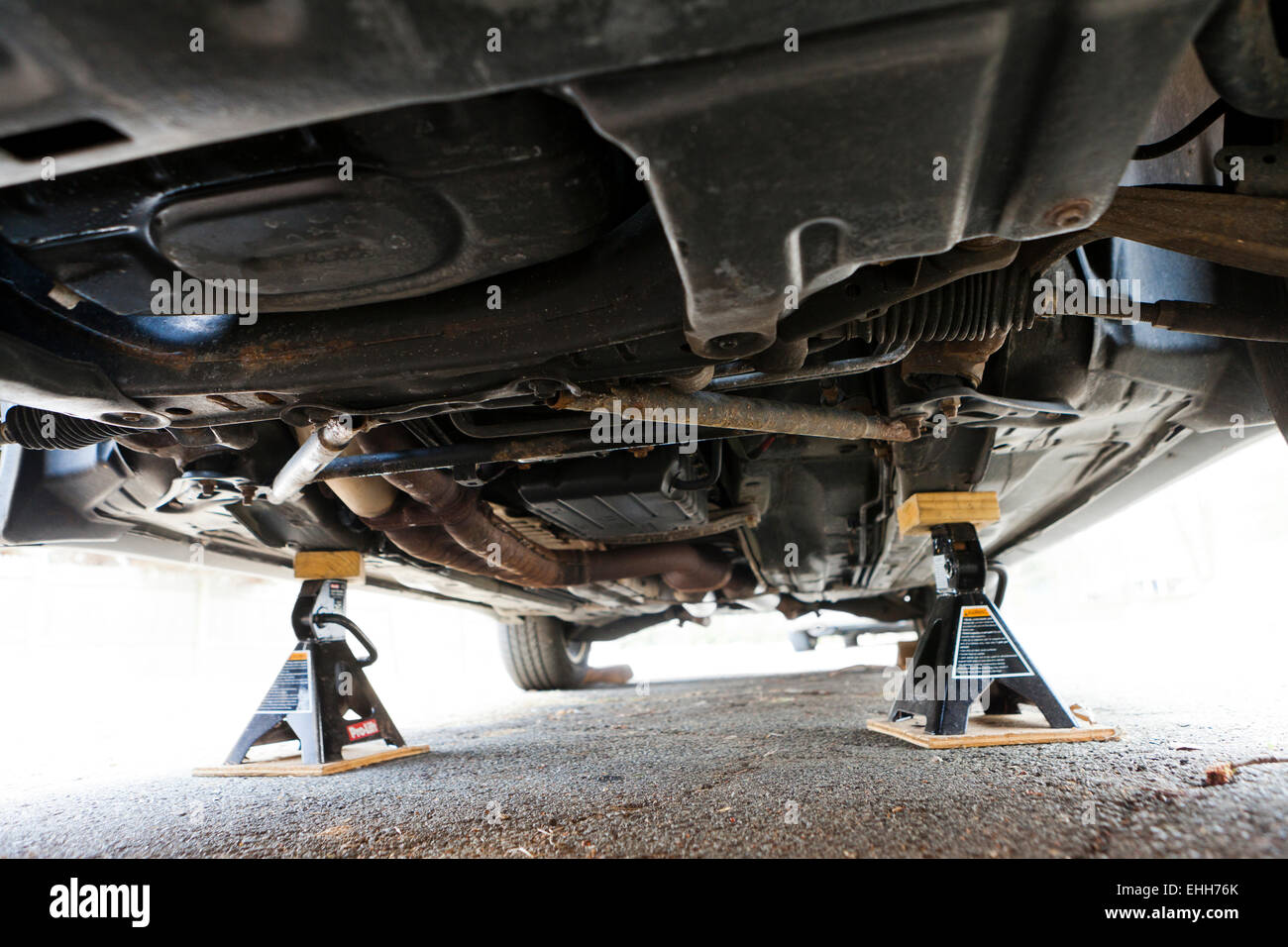 Car on jack stands for repair - USA Stock Photo