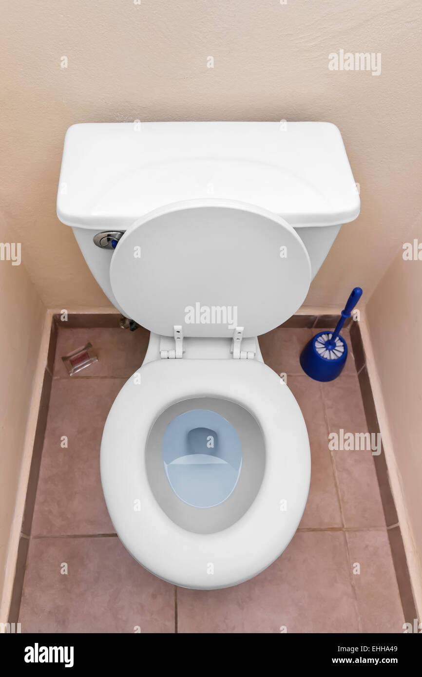 White toilet bowl in a bathroom interior Stock Photo - Alamy