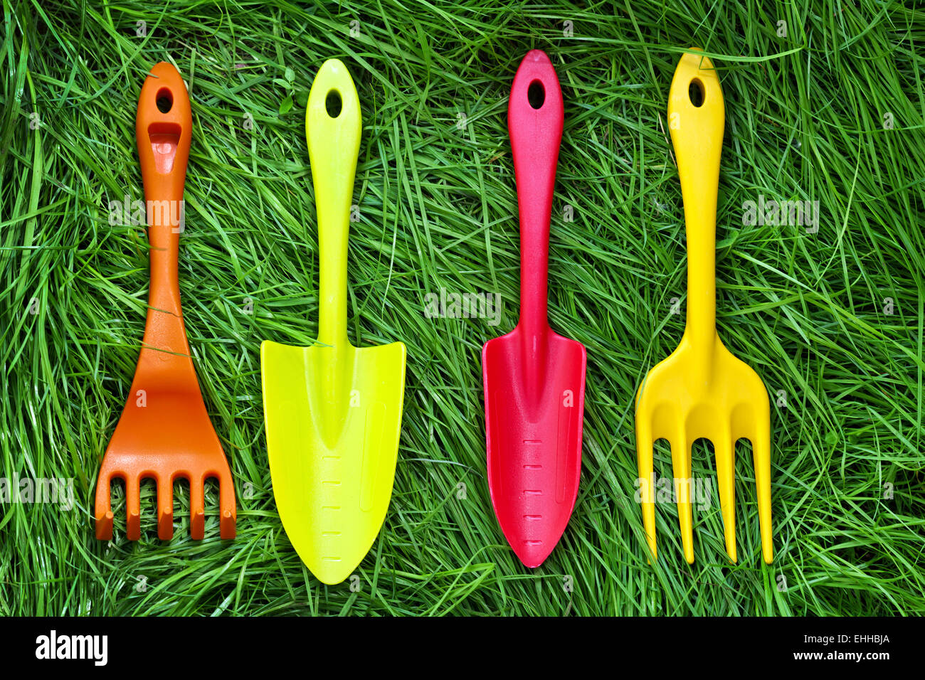 Set Of Gardening Tools On Green Grass Background Plastic Mini Stock Photo Alamy