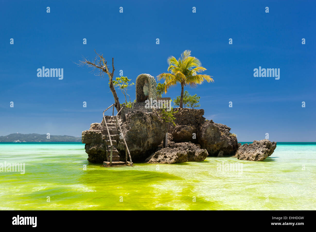 Willy's rock on island Boracay, Philippines. Boat Station One, White beach place. Stock Photo