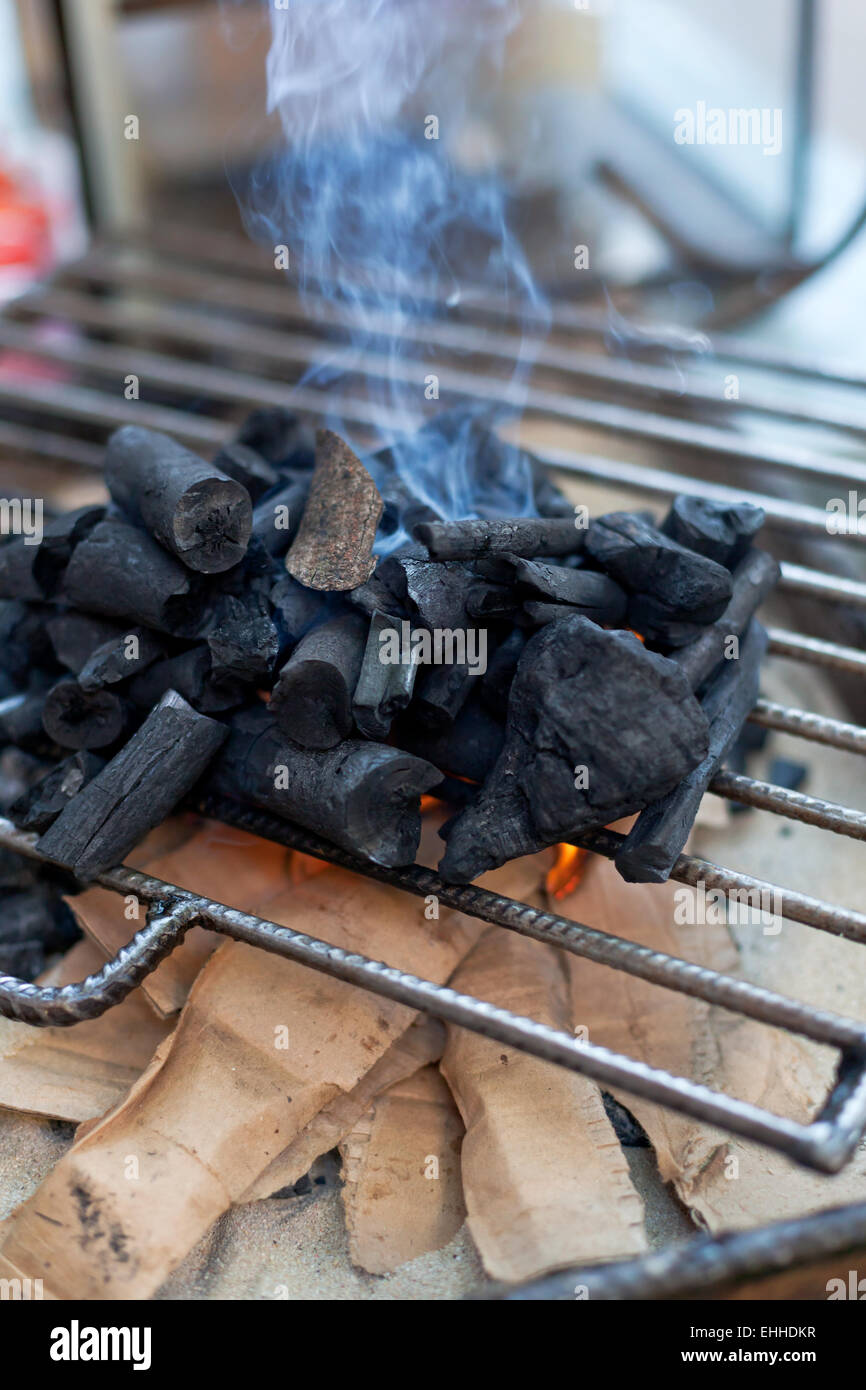 Cooking process for barbeque on stick, local food in the Philippines Stock Photo