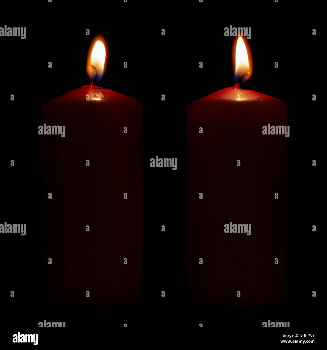 Two lighted candles isolated Stock Photo Alamy