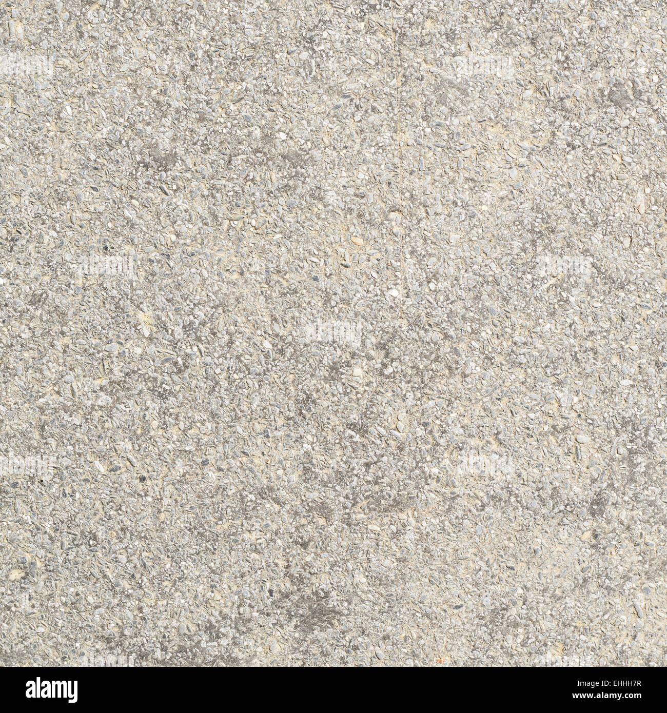Picture of Concrete wall covered with pebbles Stock Photo - Alamy