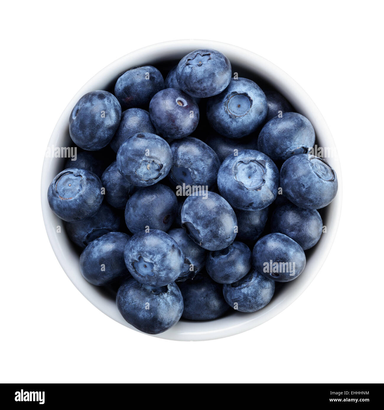 fresh ripe blueberries in white bowl directly above Stock Photo