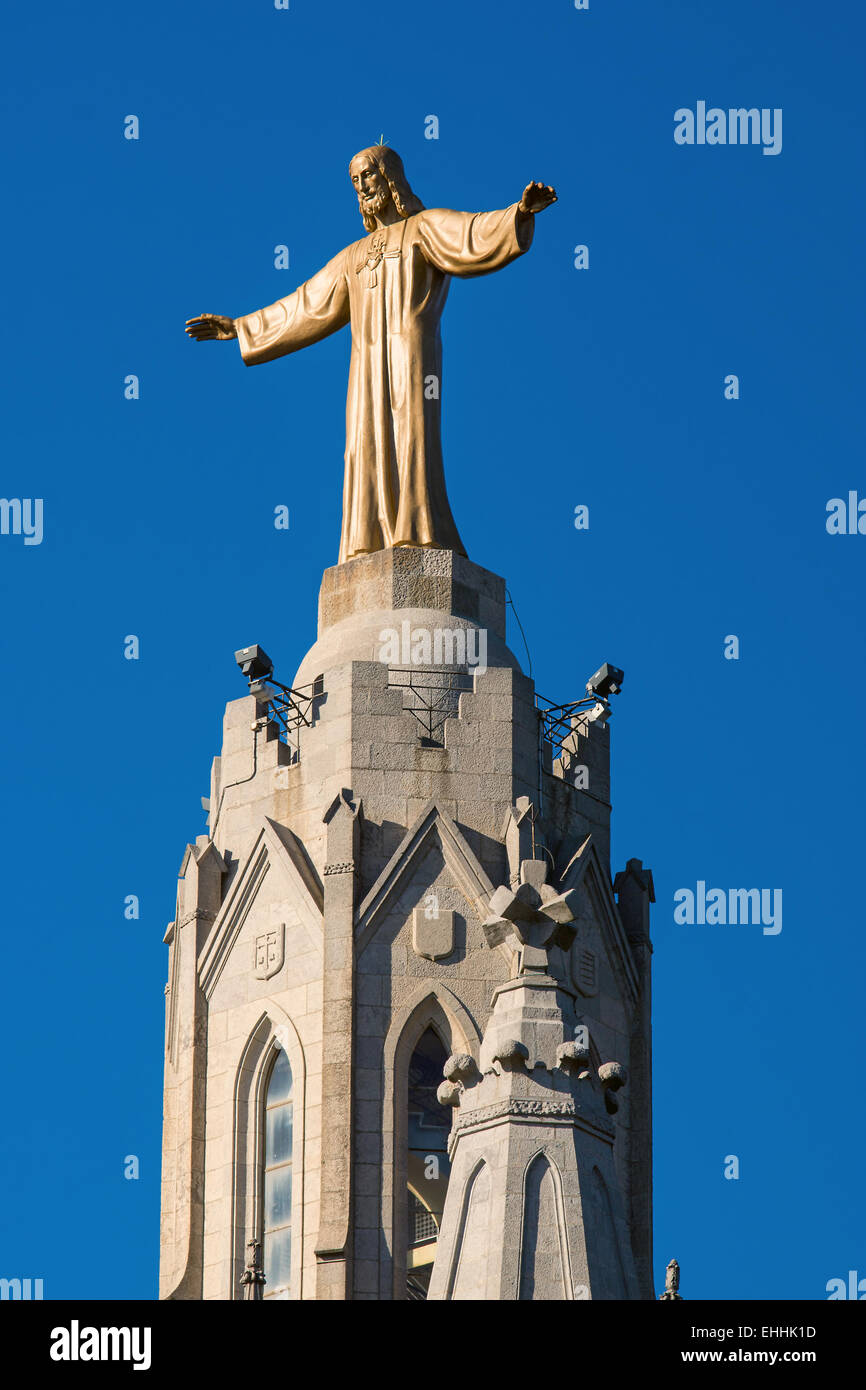 The Jesus statue on top of Expiatory Church of the Sacred Heart of Jesus on Tibidabo mountain, Barcelona, Spain Stock Photo