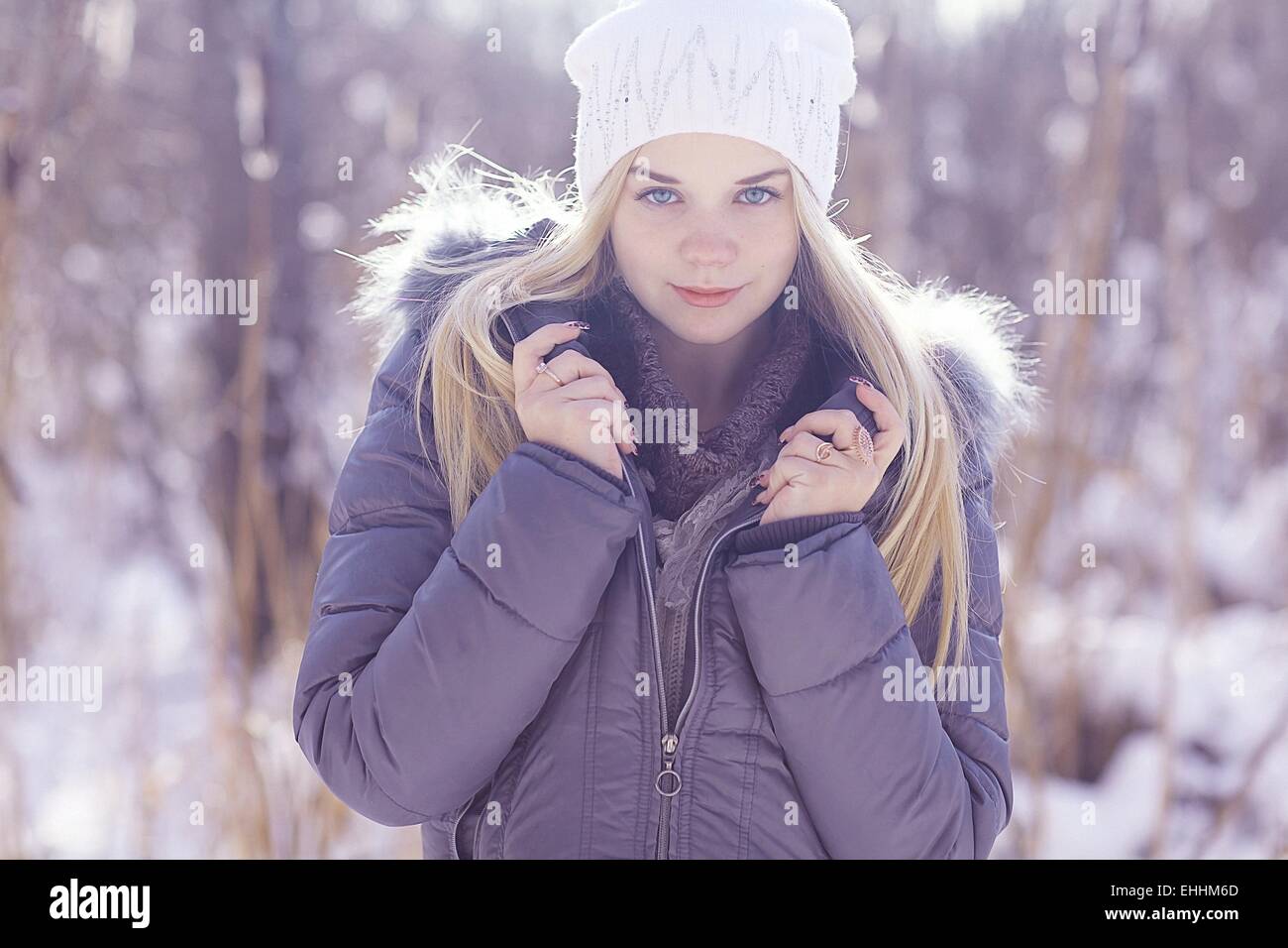winter portrait of a cute blonde teen Stock Photo - Alamy