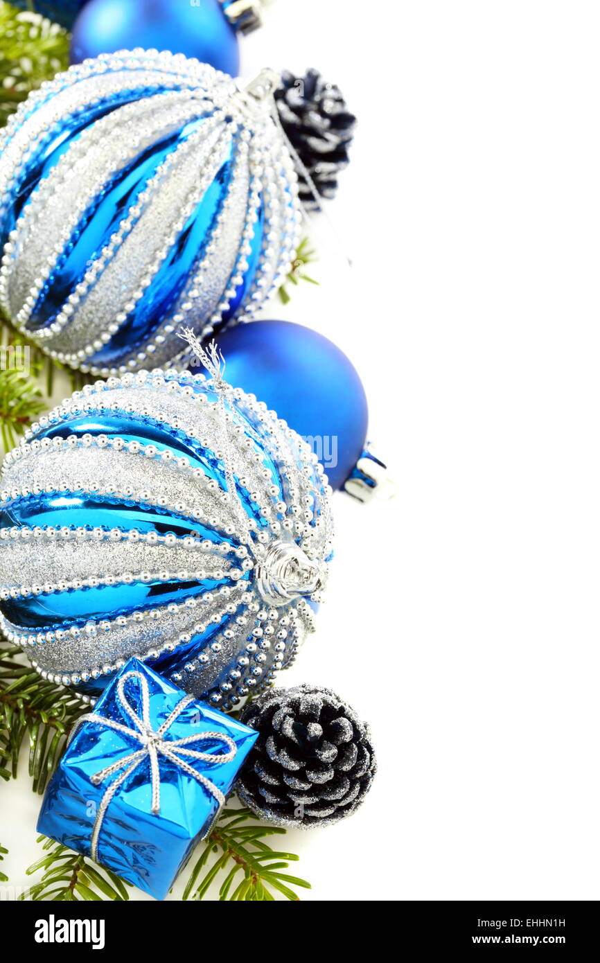Christmas card with blue balls and cones. Stock Photo