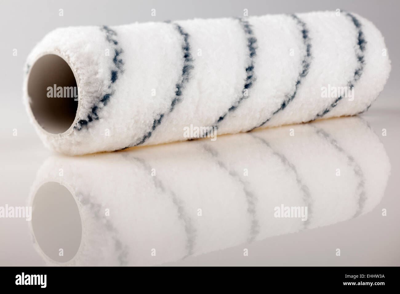 Rough texture emulsion paint roller Stock Photo Alamy