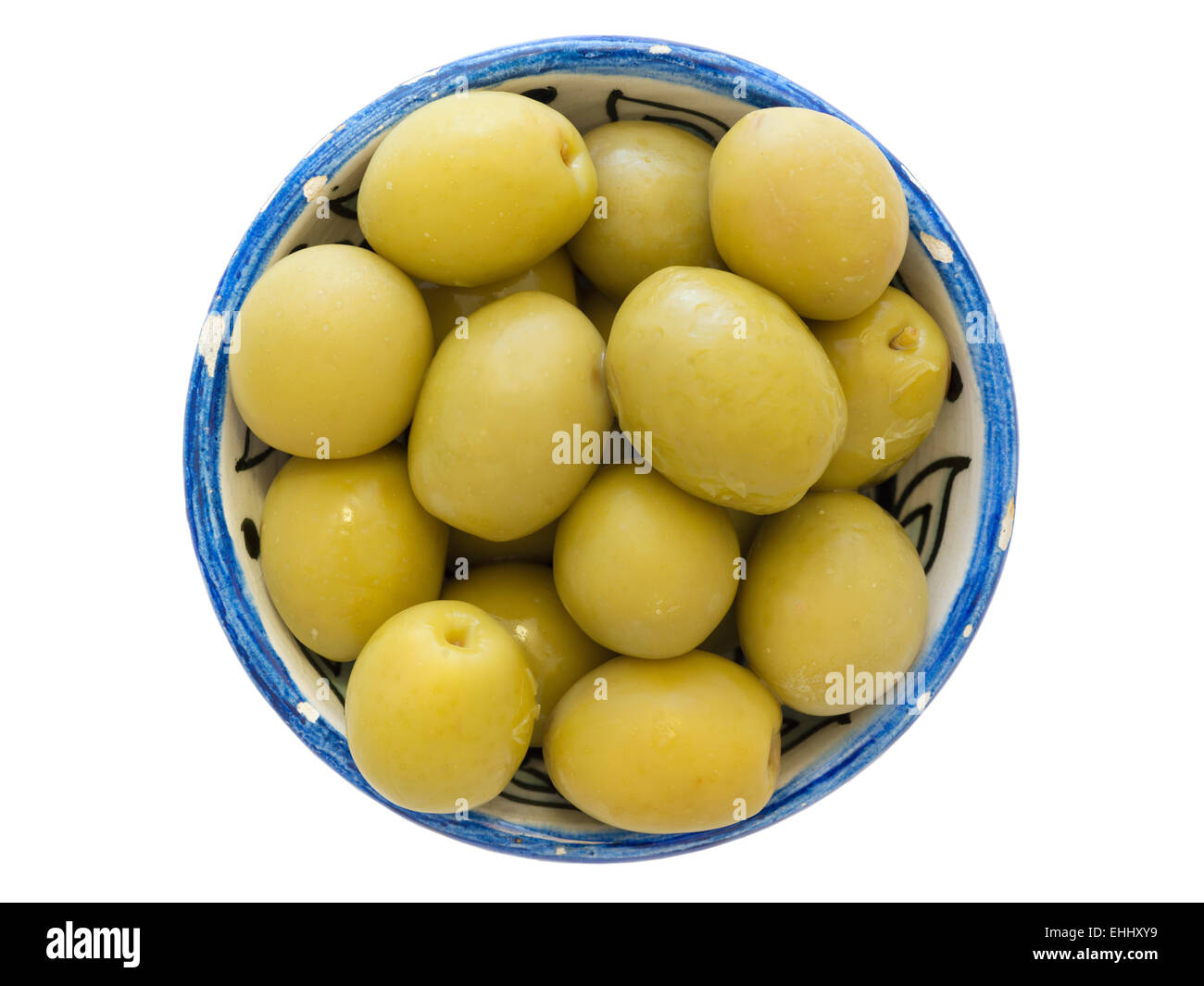 many green olives in small blue cup isolated on white Stock Photo