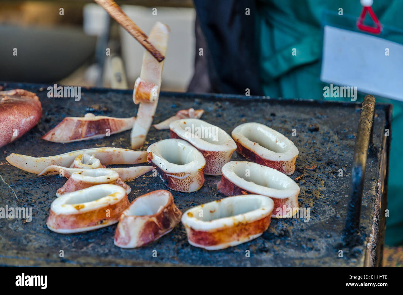 Grilled Octopus with japanese sauce on a grill Stock Photo