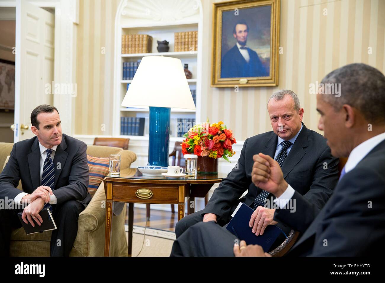 US President Barack Obama meets with retired Gen. John Allen, Special Presidential Envoy for the Global Coalition to Counter ISIL and Brett McGurk, Deputy Special Presidential Envoy, left, in the Oval Office of the White House September 16, 2014 in Washington, DC. Stock Photo