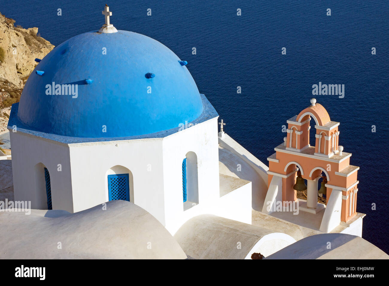 Church and ocean in Santorini Stock Photo