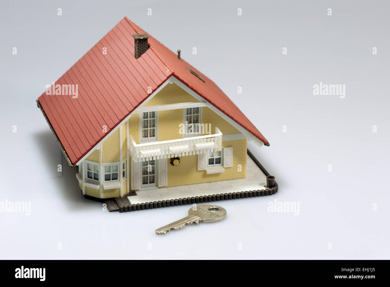 Model house with door key Stock Photo