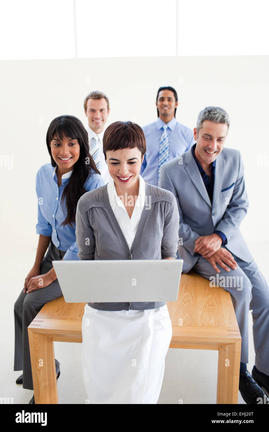 Multi ethnic colleagues happy using hi-res stock photography and images ...