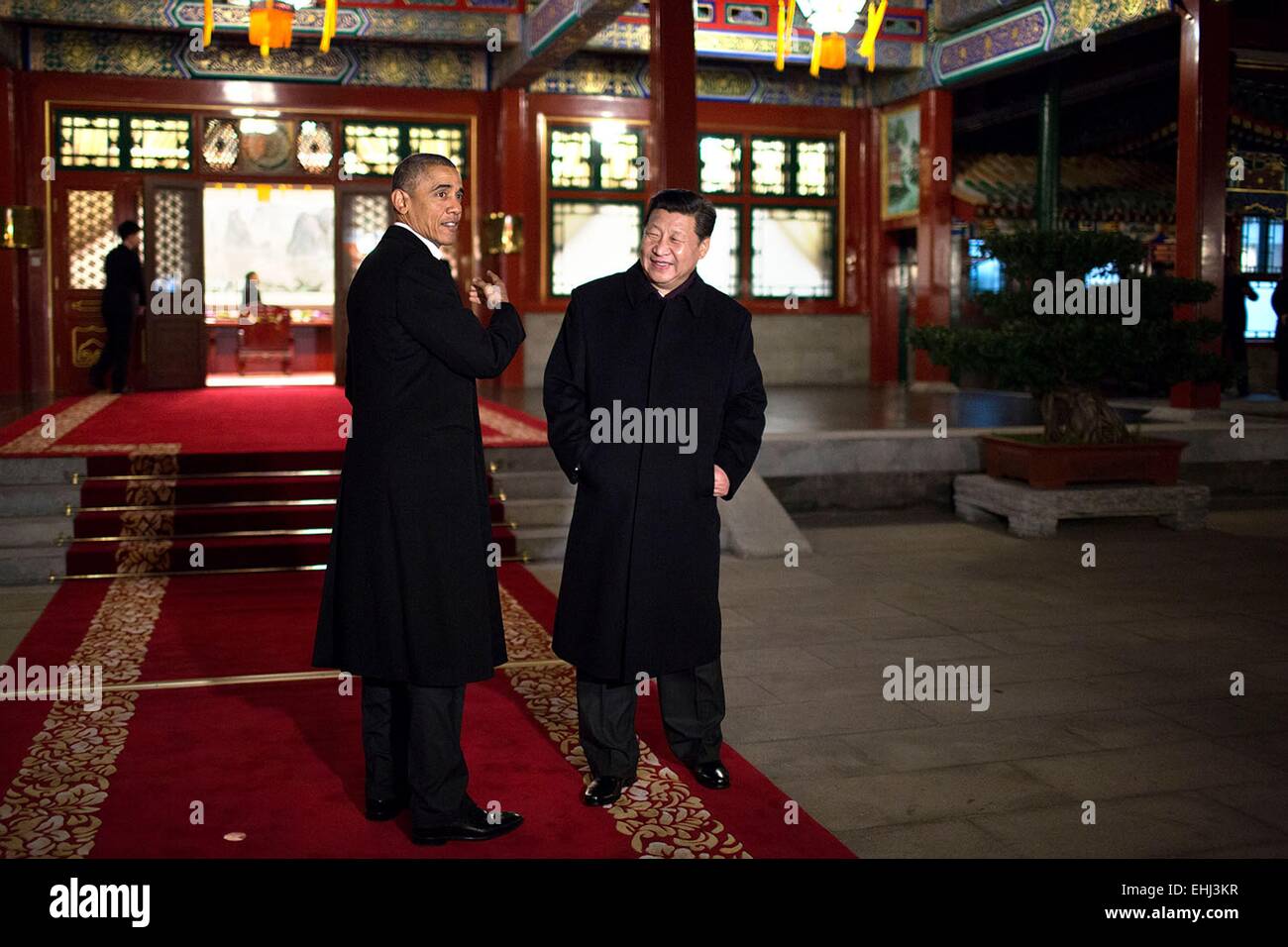 US President Barack Obama gestures as he and President Xi Jinping of China arrive for a bilateral meeting at Zhong Nan Hai November 11, 2014 in Beijing, China. Stock Photo