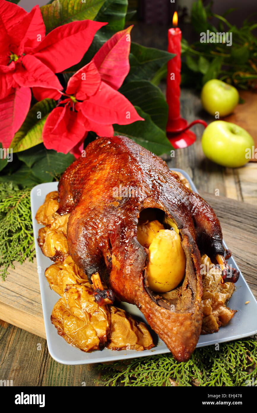 Duck with apples in honey glaze. Stock Photo