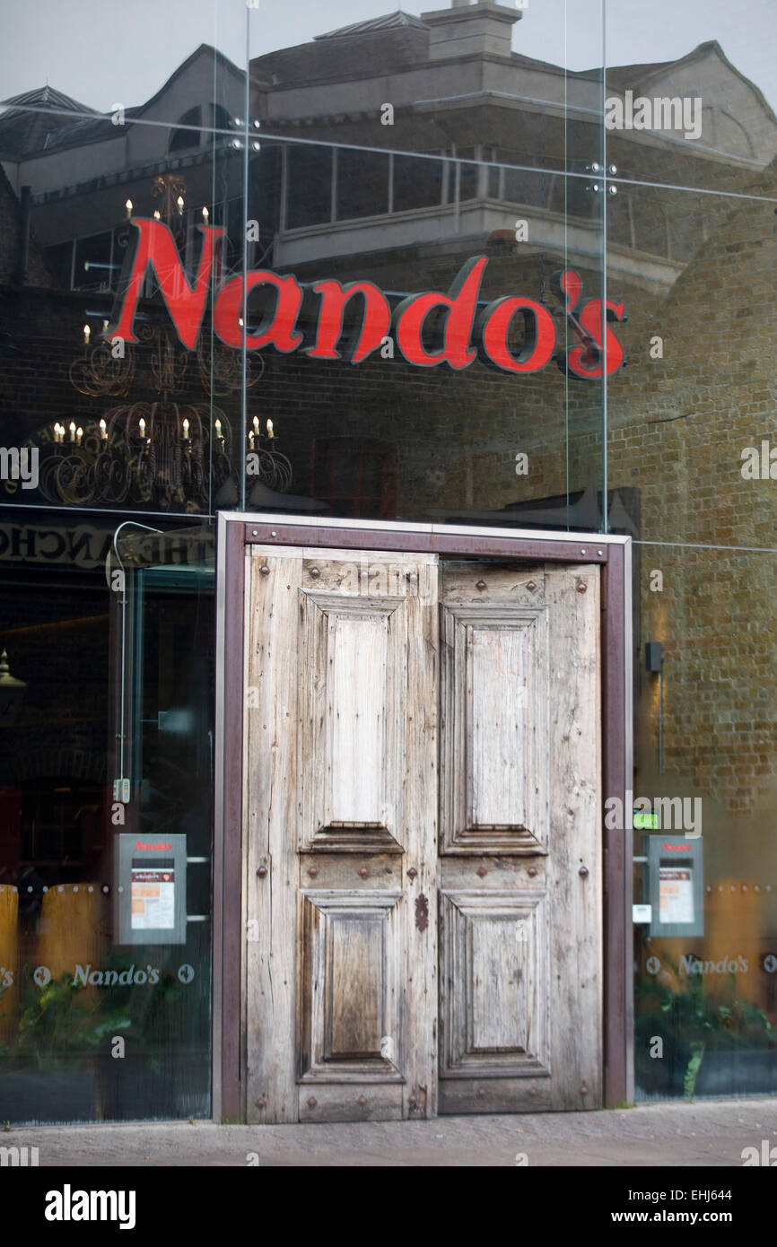 Closed wooden door at Nando s in London England Stock Photo Alamy