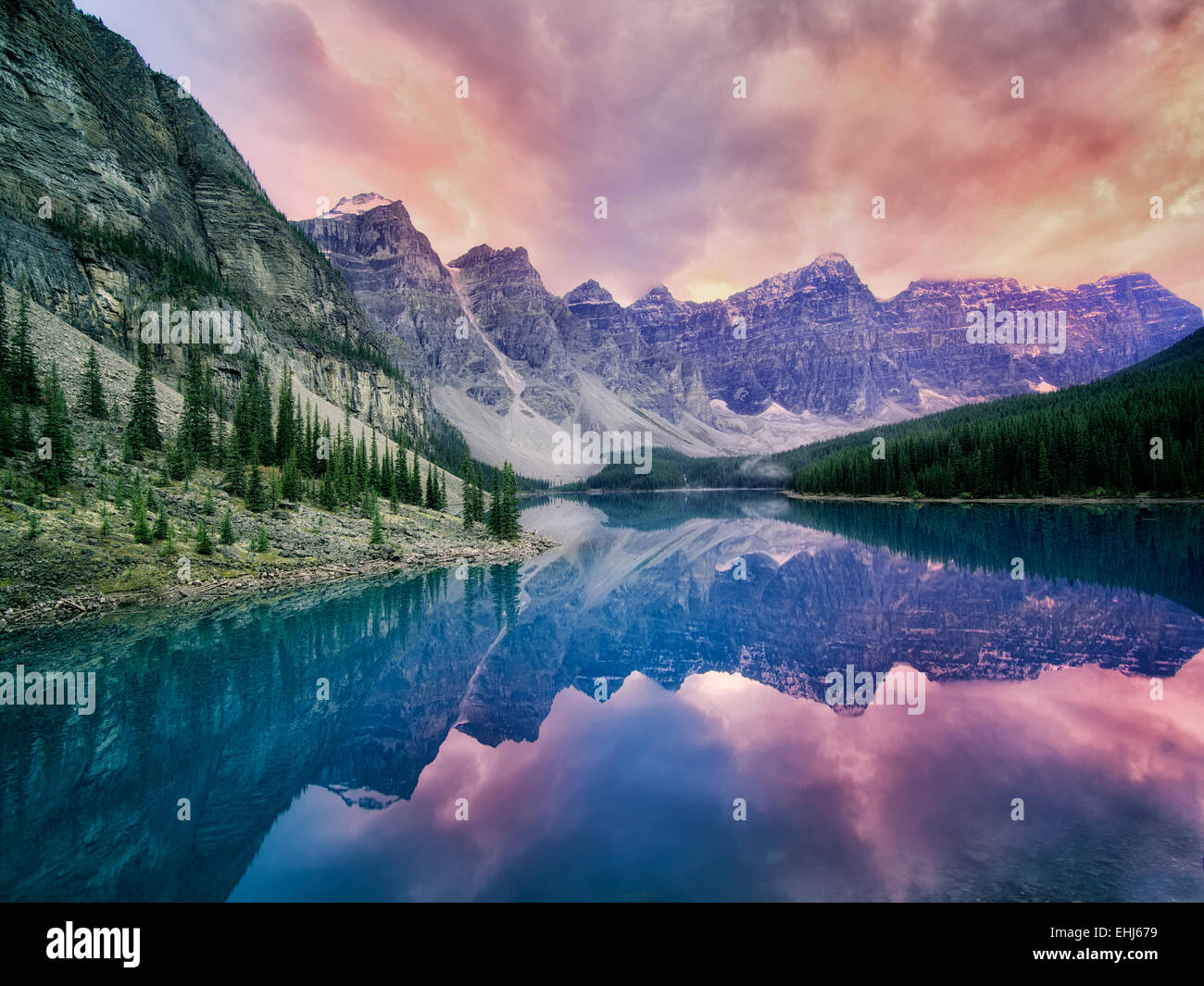 Moraine Lake with sunset clouds. Banff National Park, Canada Stock Photo