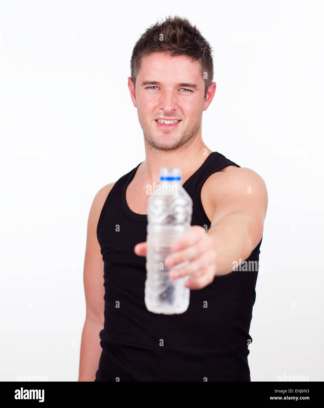 Happy Sportsman holding water bottle Stock Photo Alamy