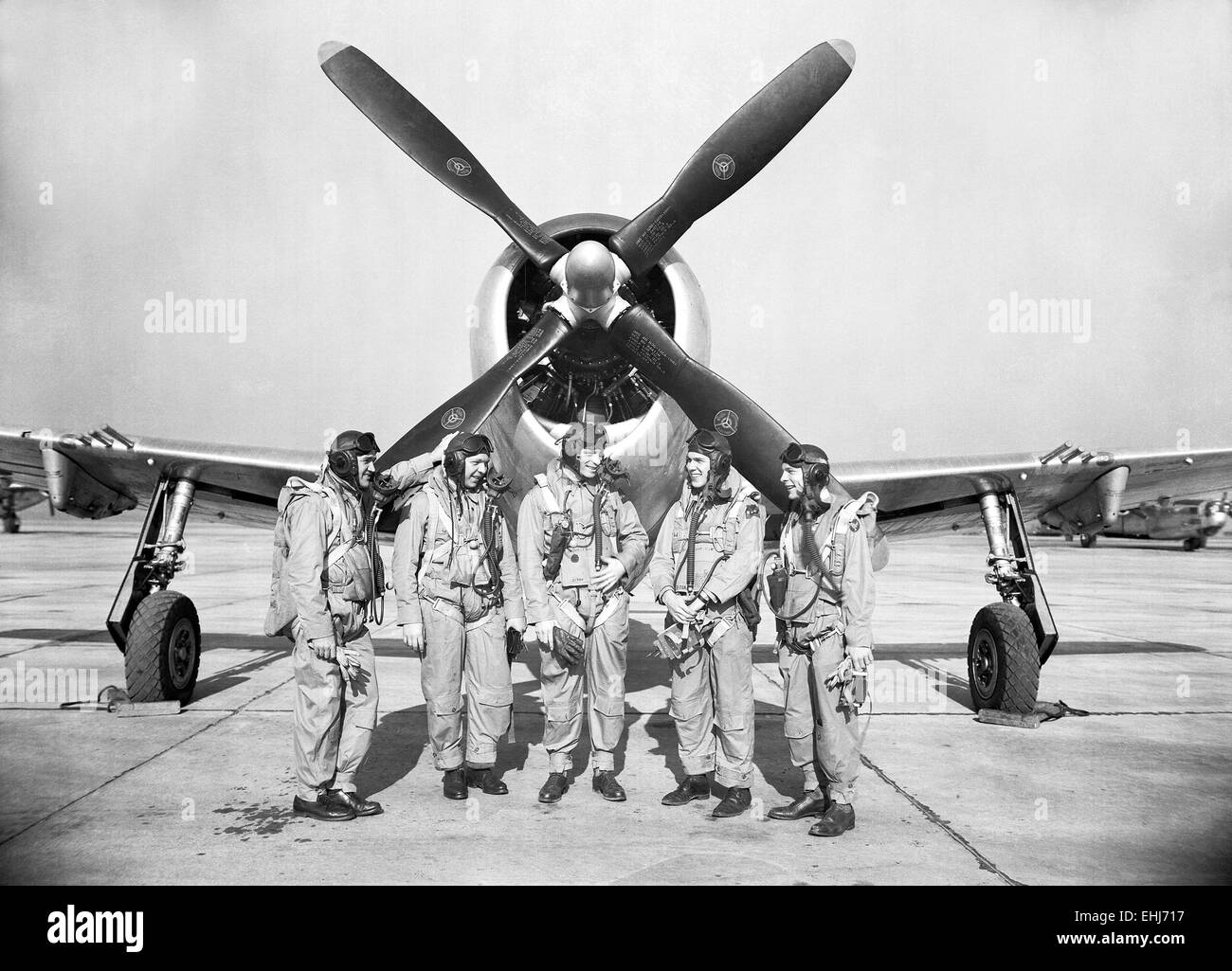 NACA photo, test pilots (from left) Mel Gough, Herb Hoover, Jack Reeder, Steve Cavallo and Bill Gray stand in front of a P-47 Thunderbolt. Stock Photo
