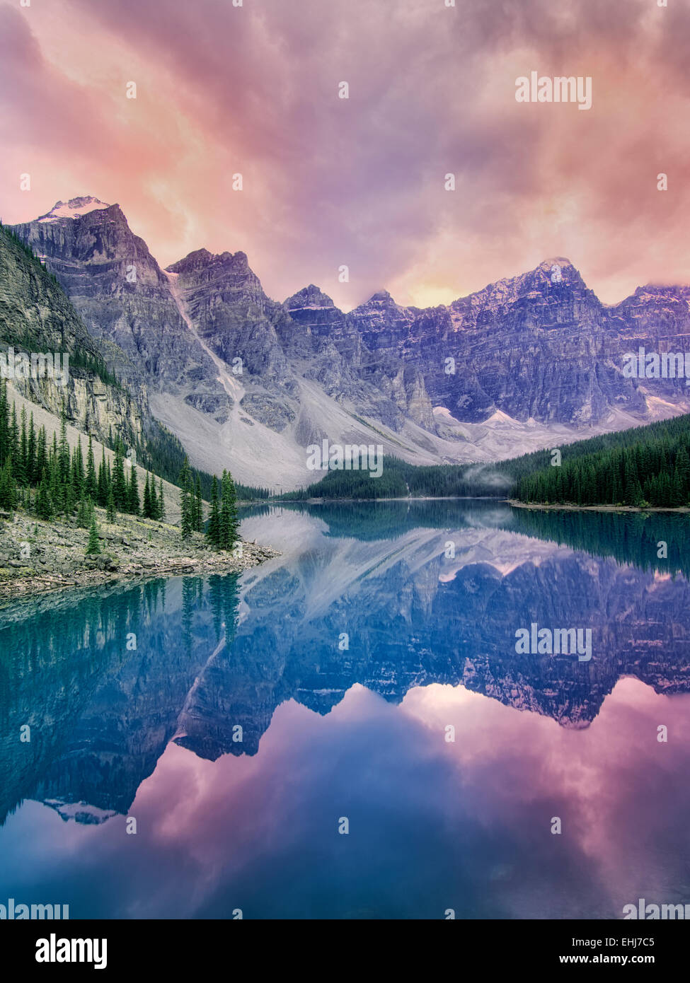 Moraine Lake with sunset clouds. Banff National Park, Canada Stock Photo