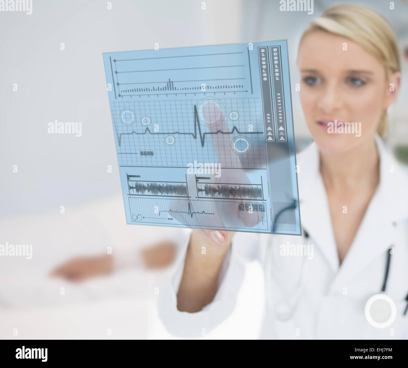 Doctor pressing on ECG line interface Stock Photo - Alamy
