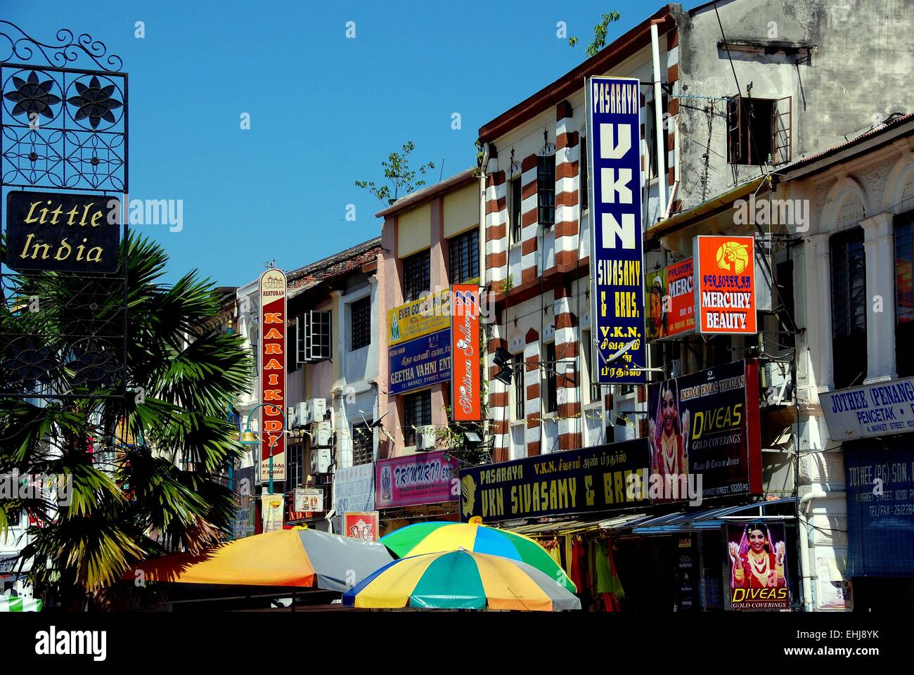 Georgetown, Malaysia: Storefronts in Little India on Lebuh Pasar with their colourful buildings and signs Stock Photo
