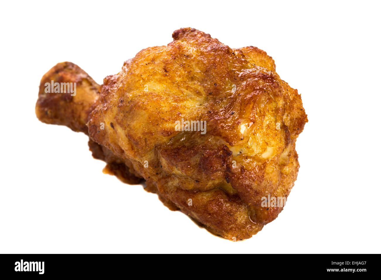 Golden brown fried chicken drumsticks isolated over white background Stock Photo