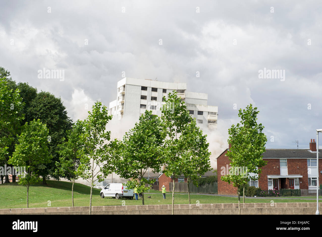 The demolition of an old block of flats at Orchard Park estate in
