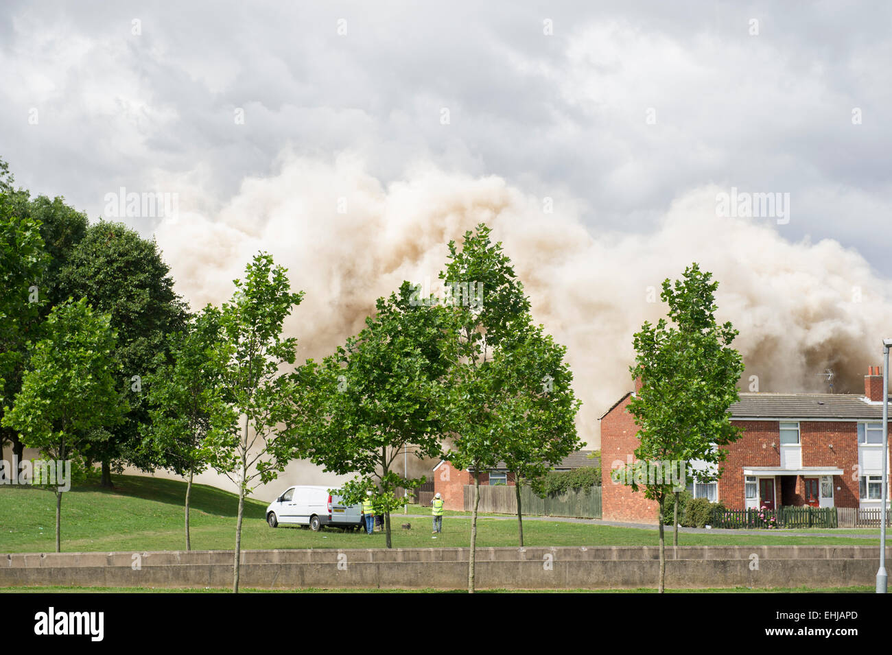 The demolition of an old block of flats at Orchard Park estate in