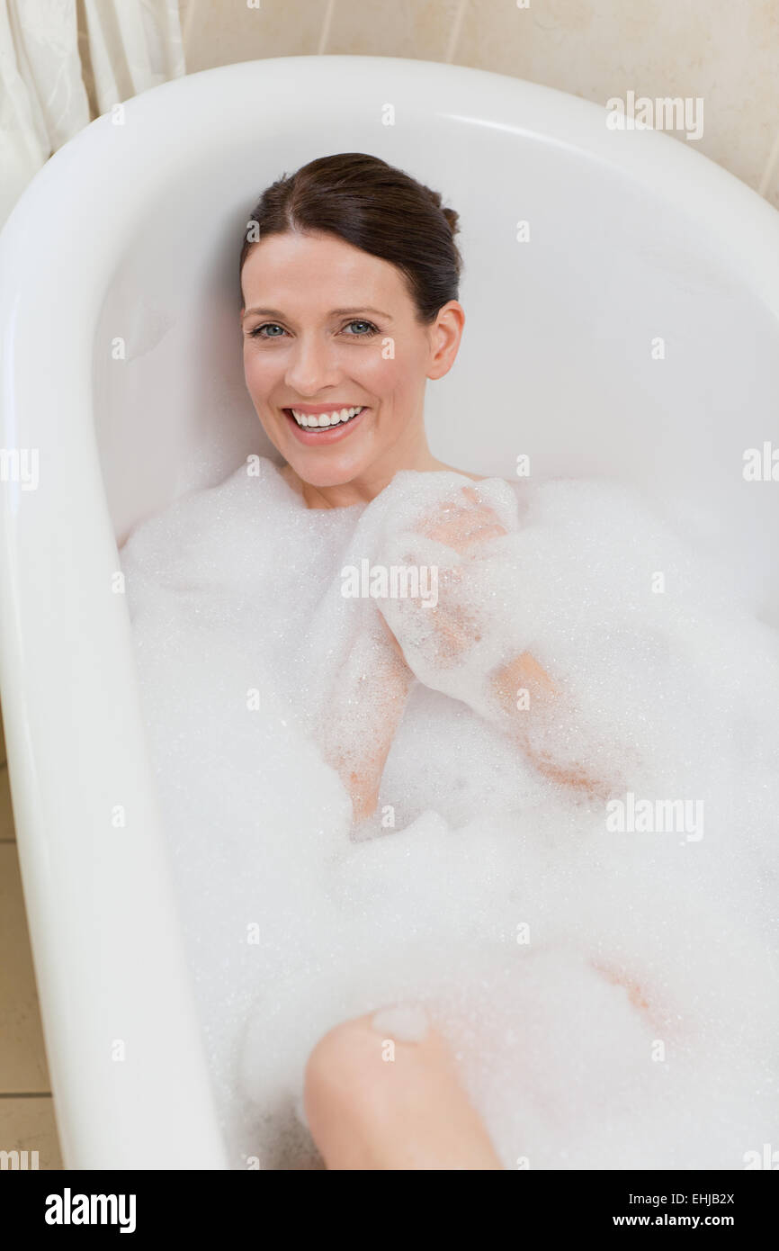 Beautiful woman taking a bath Stock Photo Alamy